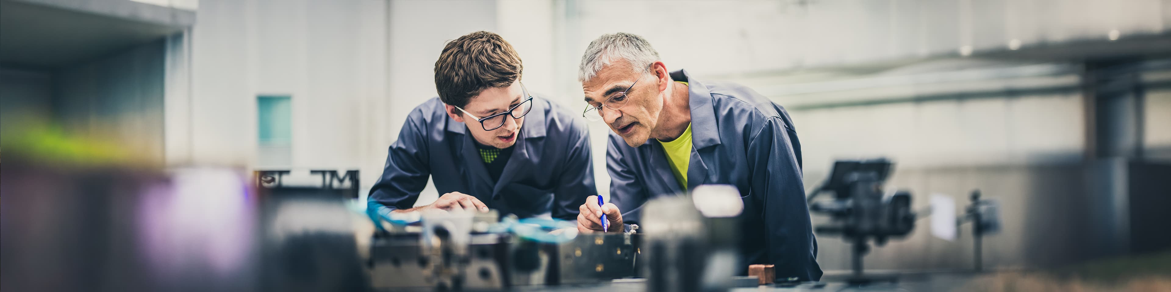 Elder scientist with his apprentice in the labolatory