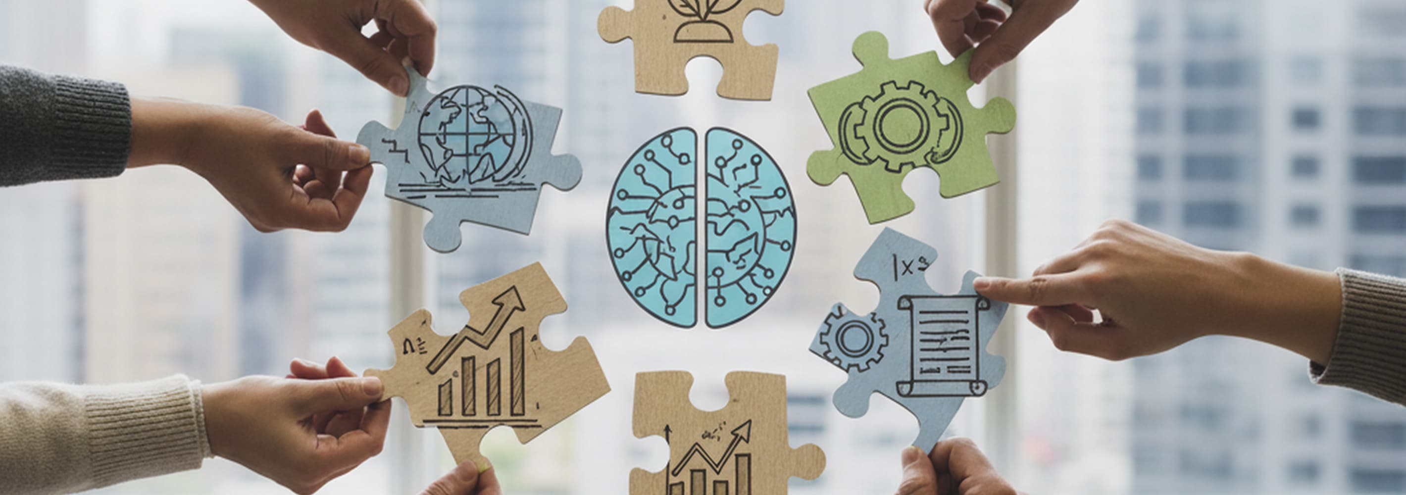 5 Hands holdings puzzles with scientific icons and trying to put them together